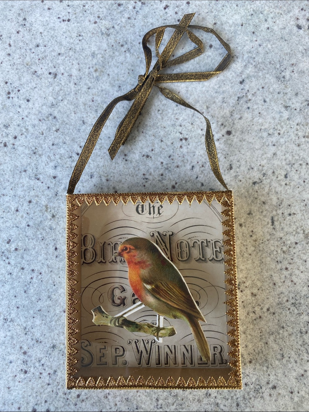 Vintage-Style Gold Bird Ornament with Red & Green Bird